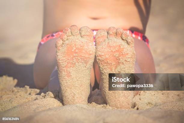 Little Girls Feet In The Beach Sand Stock Photo - Download Image Now - Barefoot, Beach, Beach Holiday
