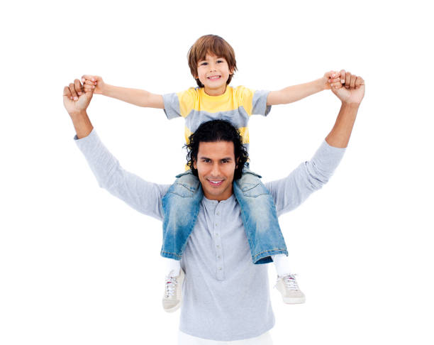 istock Handsome father giving a piggyback to his son 856167102