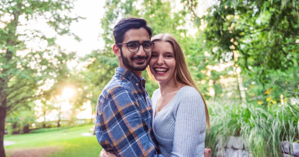 istock Smiling couple in the city park 856170662