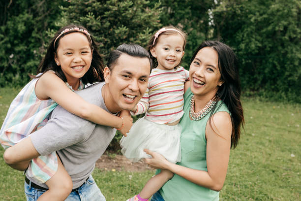 istock Happy family having fun outdoor 856171232