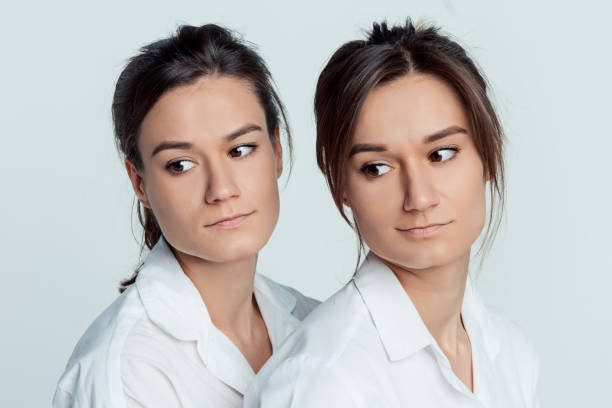 istock Studio portrait of female twins 856171540