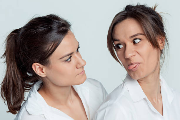 istock Studio portrait of female twins 856173606