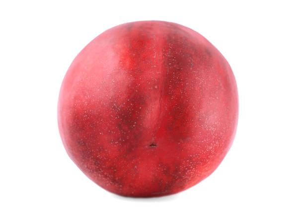 istock Top view of a red nectarine, isolated on a white background. Appetizing beautiful fruit, full of vitamins. Vegetarian lifestyle. 856173846