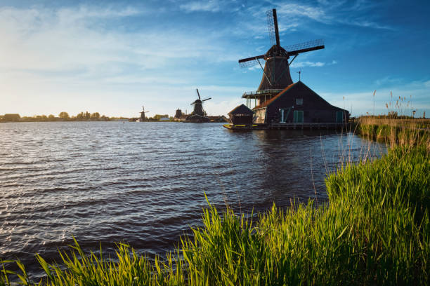 istock Windmills at Zaanse Schans in Holland on sunset. Zaandam, Nether 856174214