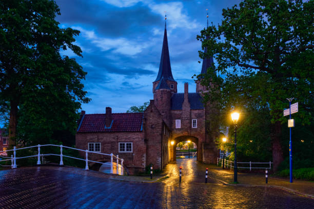 istock Oostport (Eastern Gate) of Delft at night. Delft, Netherlands 856174274