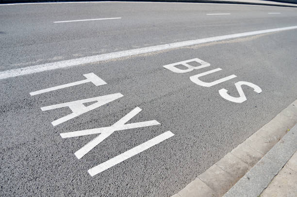 istock taxi and bus lane 856177312