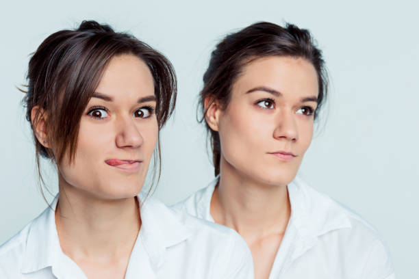 istock Studio portrait of female twins 856178080