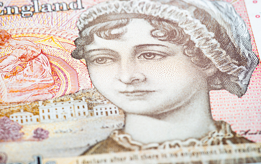 Close-up on the surface of a 2017 polymer £10 note, featuring the 19th Century author Jane Austen.