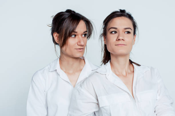 istock Studio portrait of female twins 856178474