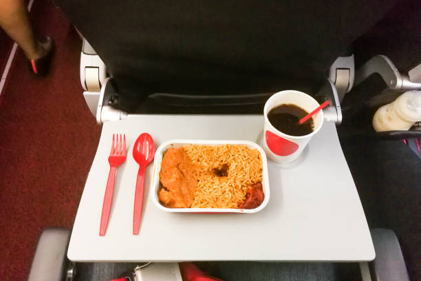 istock Simple in-flight meal of rice, meat, coffee in disposable utensils 856178726
