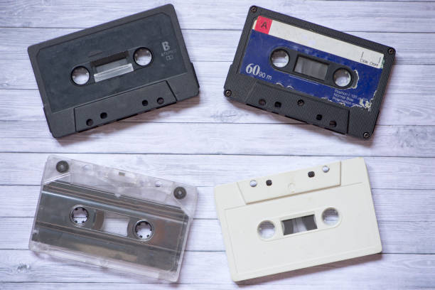 istock Old cassette tapes with a wooden background 856182010