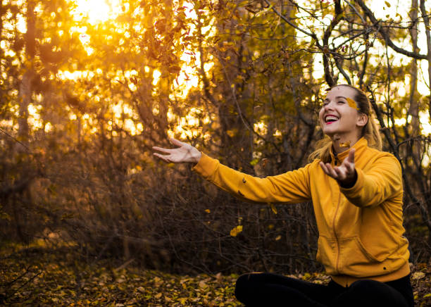 istock Girl in autumn park 856188506