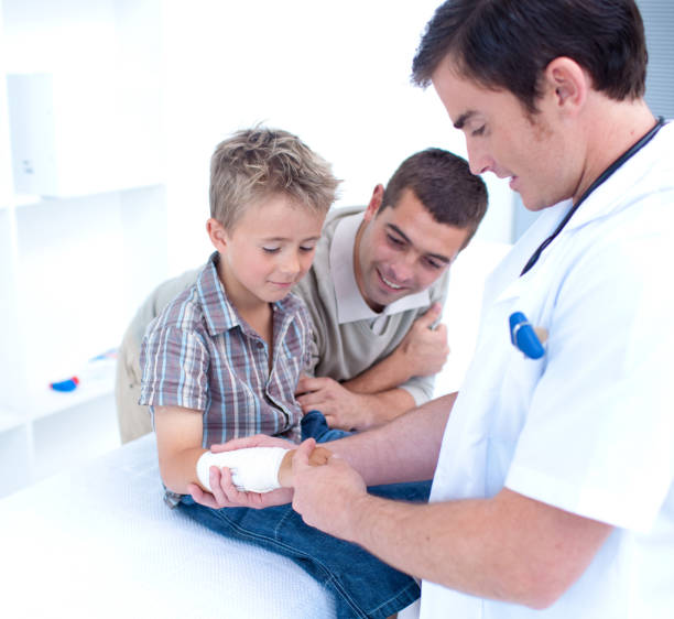 istock Doctor bandagins a patient 856193590