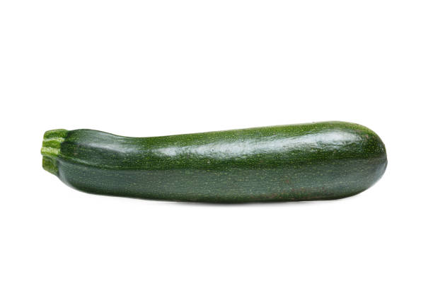 istock One green zucchini or courgette isolated on white background. 856207792