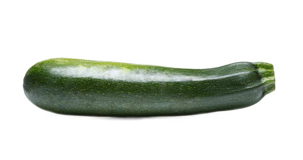 istock One green zucchini or courgette isolated on white background. 856207898