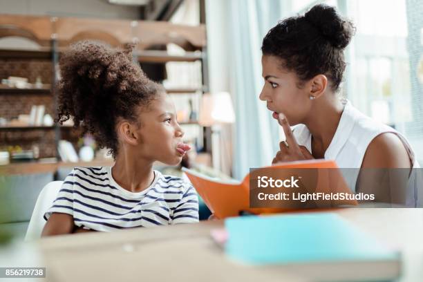 Mom Scolding Daughter Stock Photo - Download Image Now - Anger, Child, Displeased