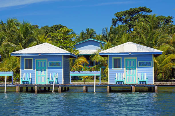 blue bungalows overwater - bocas del toro imagens e fotografias de stock