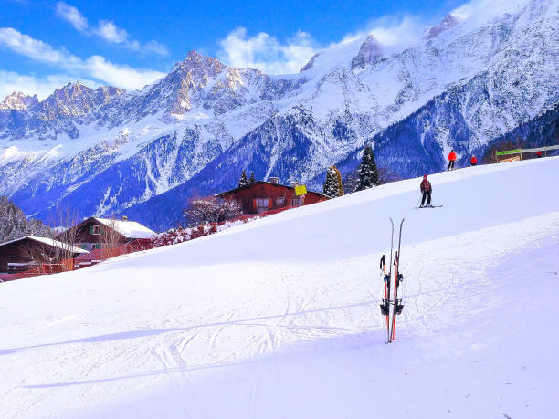 Ski slopes in the mountains of winter ski resort, in French Alps with mountains view