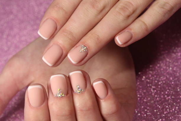 istock Youth French manicure with rhinestones 856229642
