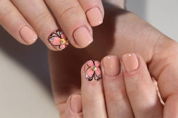 istock Youth manicure with butterfly 856231588