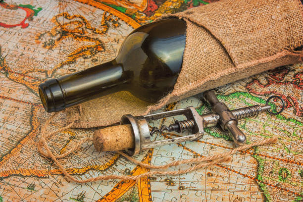bottle of wine and old corkscrew