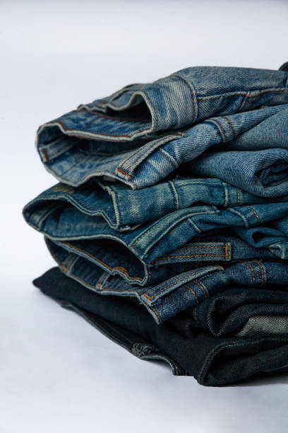 istock Stack of jeans fashion background different denim layers colors 856235220