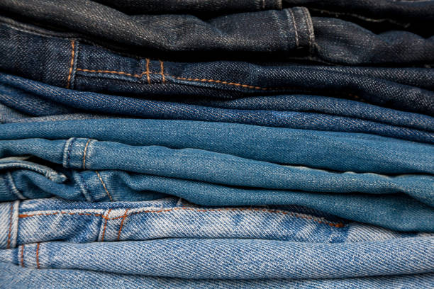 istock Stack of jeans fashion Background different denim layers colors 856236040
