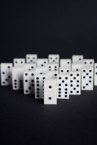istock dominoes leader buissnes concept on black background 856237776