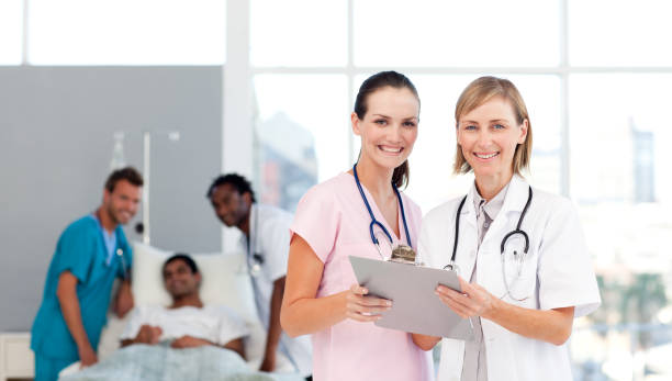 istock Attractive doctors attending to a patient 856238518