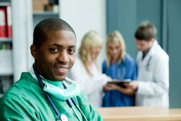 istock Portrait of an surgeon with folded arms smiling at the camera 856241286
