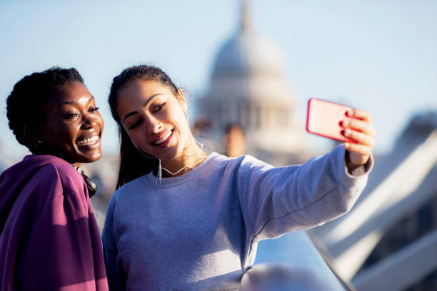 istock Friends taking selfie on millennium bridge 856241522