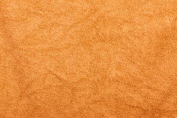 istock Orange Bathroom Towel Textile Background Texture for Design and Decoration 856246640