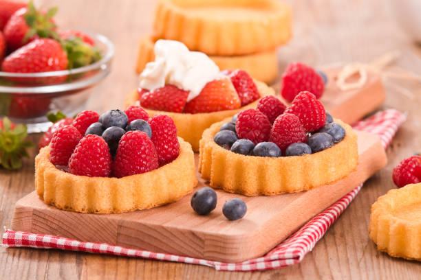 istock Tartlets with forest fruits. 856253098