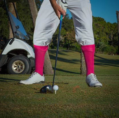 Vintage man's golfing outfit with pink socks in FL