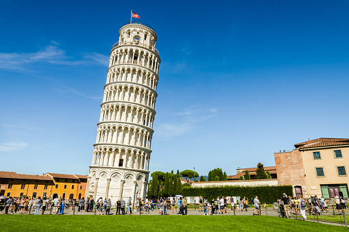 Pisa, Italy - August 17, 2014: The Leaning Tower of Pisa in the Square of Miracles (Piazza dei Miracoli).