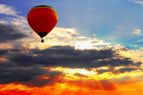 istock Bright balloon in sunset colorful sky 856273082