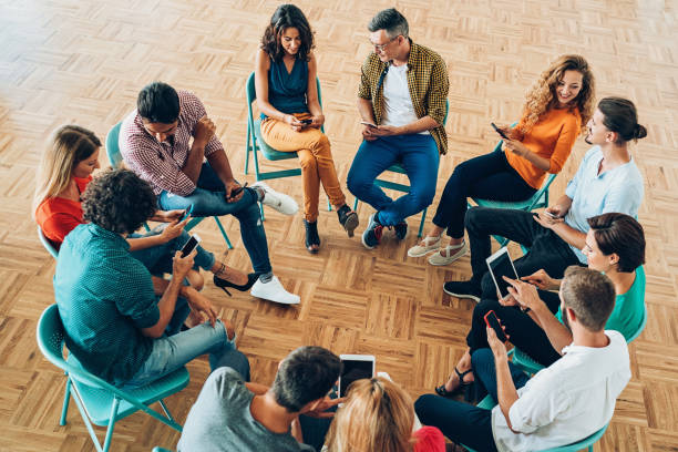 istock Large group of people social networking in a circle 856273422