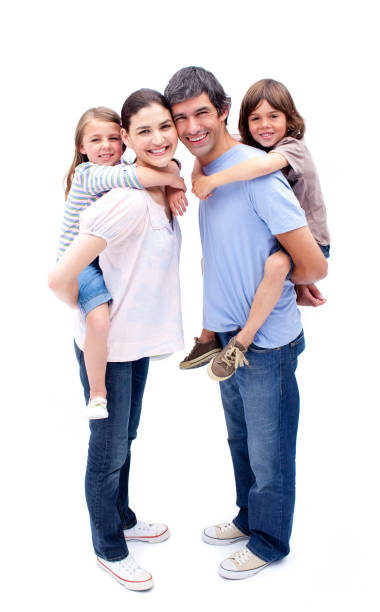 istock Jolly parents giving their children a piggyback ride 856276096