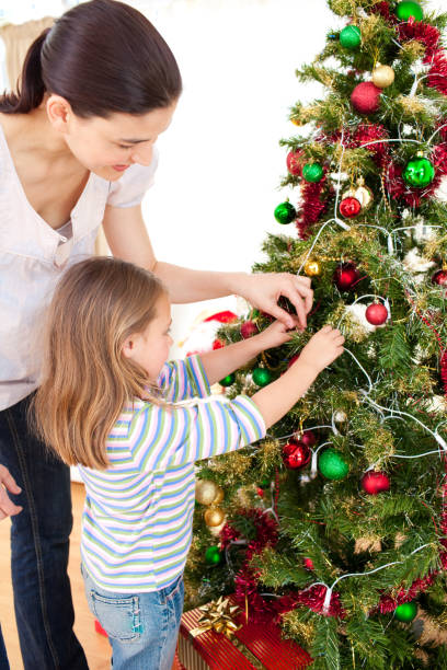 istock Mother and daughter at home at Christmas time 856279020