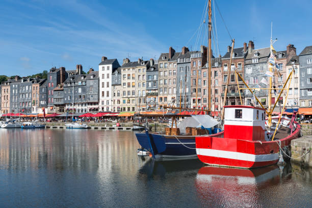 istock Fishing ship in old medieval harbor Honfleur, France 856295064