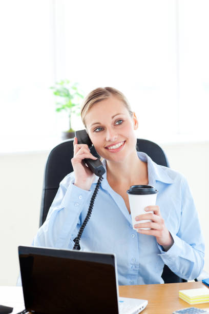 istock Beautiful female doctor talking on phone 856298466