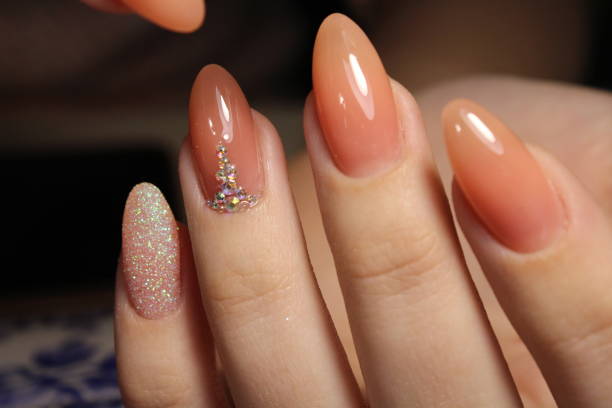 istock Manicure design camouflage colors for woman 856301228