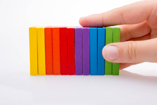 istock Hand holding color dominoes 856304138