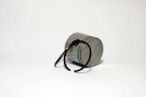 istock photo the piston and rings isolated on a white background 856308158