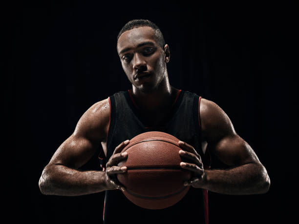 istock The african man basketball player standing with ball 856311188