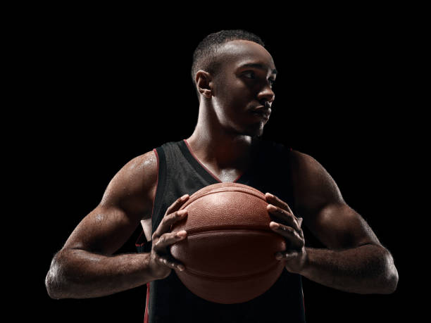 istock The african man basketball player standing with ball 856311240