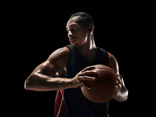 istock The african man basketball player standing with ball 856311530