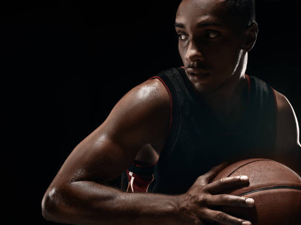istock The african man basketball player standing with ball 856311630