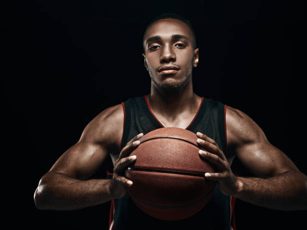 istock The african man basketball player standing with ball 856312030