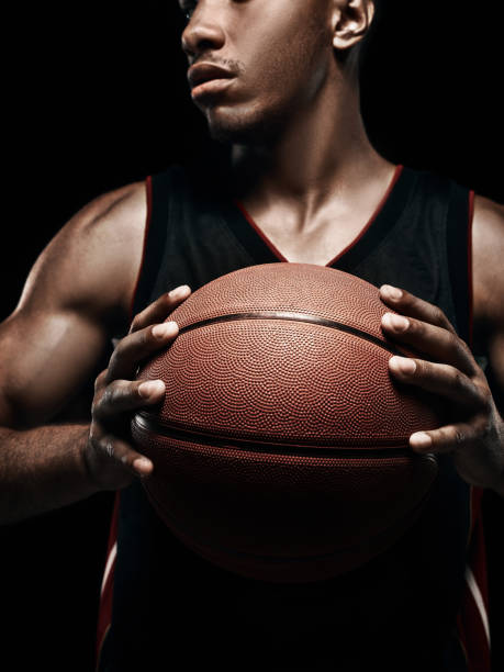 istock The african man basketball player standing with ball 856312190